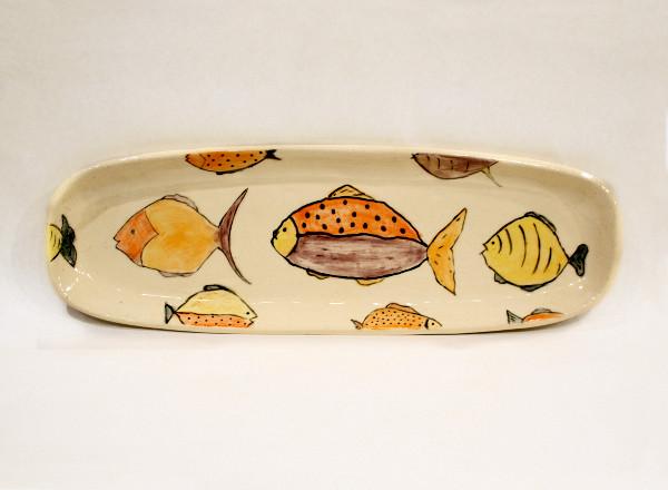 Handmade porcelain serving platter with fish images.