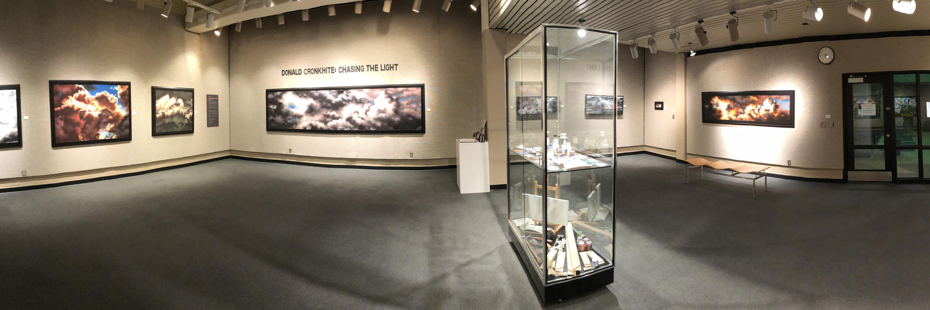 Panoramic image of gallery exhibition "Donald Cronkhite: Chasing The Light"