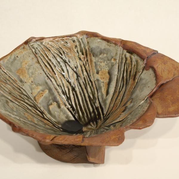 Handmade ceramic bowl with rustic surface