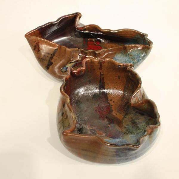 Set of hand thrown, altered, ceramic bowls, to resemble the state of Michigan